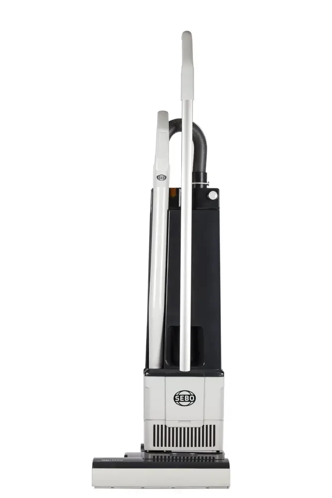 SEBO vacuum cleaner used during the first stage of carpet cleaning